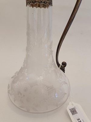 Lot 37 - A good silver-mounted wheel engraved glass claret jug by Horace Woodward & Co.