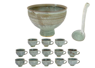 Lot 390 - Louis Hanssen (1934-1968) A studio pottery punch bowl, with ladle, and thirteen cups.