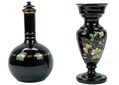 Lot 416 - An aesthetic movement pottery bottle vase and cover.