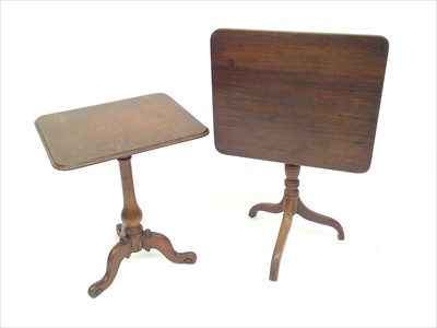 Lot 3447 - A George III mahogany tripod table and an oak...
