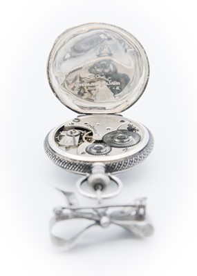 Lot 37 - OMEGA - A silver cased crown wind fob pocket watch on silver bow brooch.