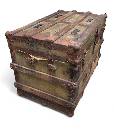 Lot 1331 - An early 20th century iron bound trunk.