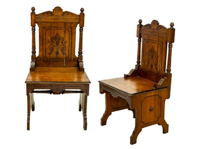 Lot 592 - A pair of late Victorian aesthetic movement oak side chairs.