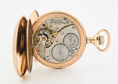 Lot 38 - WALTHAM - A rose gold plated full hunter crown wind fob pocket watch.