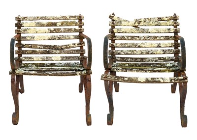 Lot 530 - A pair of wrought metal and slatted wood garden chairs.