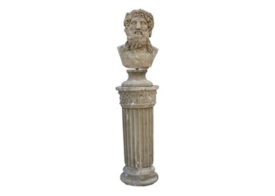 Lot 561 - A reconstituted stone sculpture of a male head, raised on fluted column.