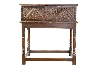 Lot 293 - A 17th century carved oak bible box.