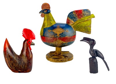 Lot 162 - A wood-carved and painted box in the form of a hen.