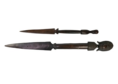 Lot 219 - An African wooden spear.