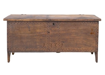 Lot 1157 - An 18th century oak six plank chest, dated 1731