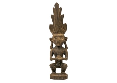 Lot 192 - A wood carved ancestor figure Adu Zatua.