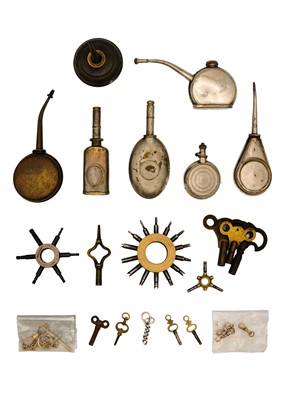 Lot 256 - A collection of six watchmakers oil cans and a selection of watch and clock keys.