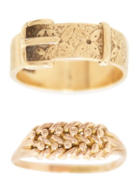 Lot 18 - An early 20th-century 9ct rose gold keeper ring and a 9ct buckle ring.