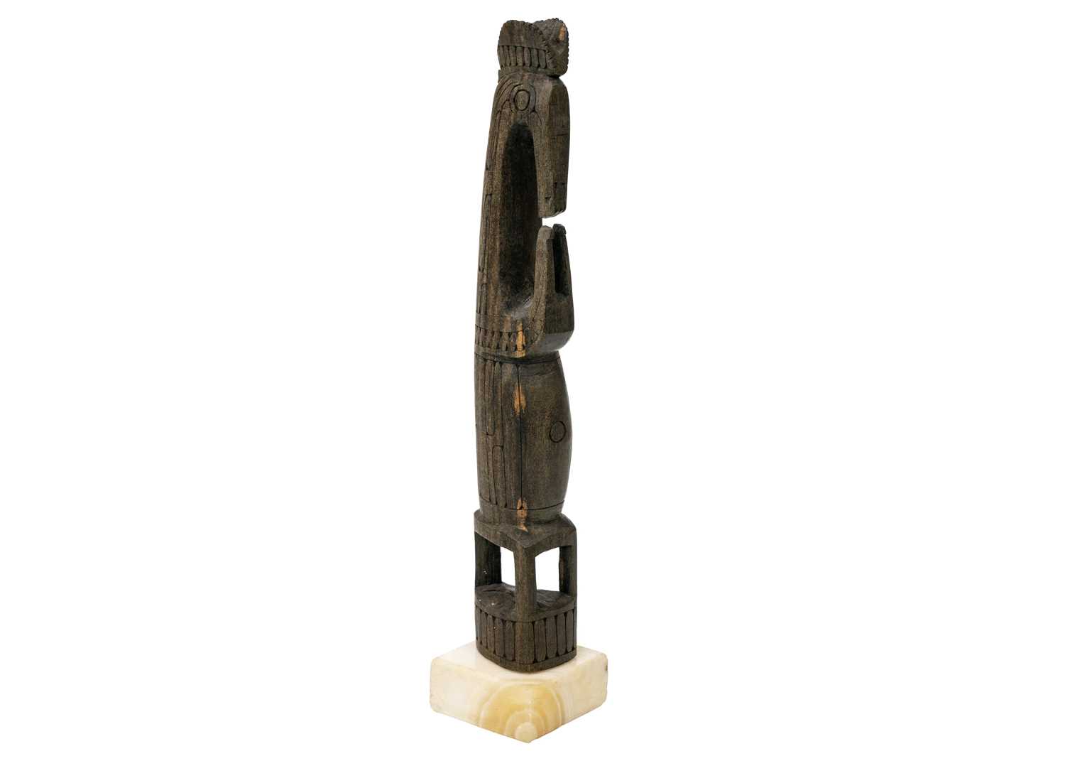Lot 197 - A finely carved Oceania figure.