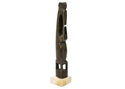 Lot 197 - A finely carved Oceania figure.