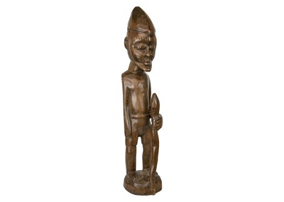 Lot 215 - A large African wood carved standing figure.