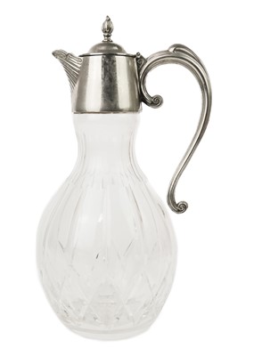 Lot 394 - A cut glass claret jug.