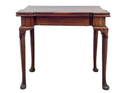 Lot 633 - An early George III mahogany fold top tea table.