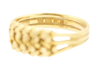 Lot 33 - A Victorian 18ct keeper ring.