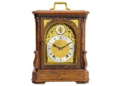 Lot 567 - A German Winterhalder and Hofmeier oak cased chiming bracket clock.