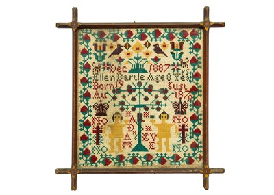 Lot 1592 - A Victorian cross stich wool work sampler.