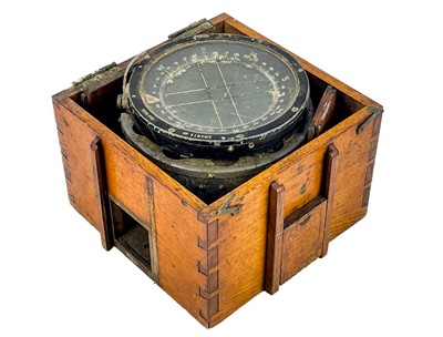 Lot 302 - A WWII oak cased Air Force compass.