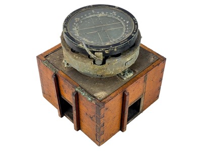 Lot 302 - A WWII oak cased Air Force compass.