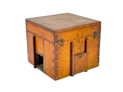 Lot 302 - A WWII oak cased Air Force compass.