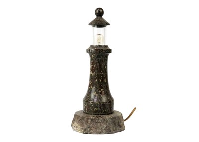 Lot 158 - A Cornish serpentine turned lighthouse table lamp.