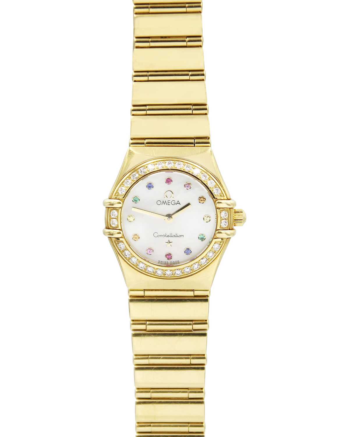 Lot 140 - OMEGA - An 18ct Constellation 'Iris My Choice' lady's quartz wristwatch with diamond-set bezel.