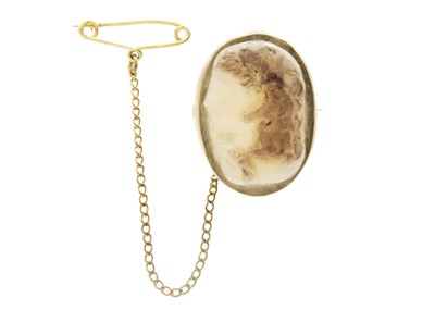 Lot 42 - A sardonyx cameo rose gold mounted brooch, possibly Georgian.