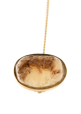 Lot 42 - A sardonyx cameo rose gold mounted brooch, possibly Georgian.