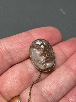 Lot 42 - A sardonyx cameo rose gold mounted brooch, possibly Georgian.