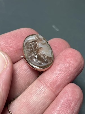 Lot 42 - A sardonyx cameo rose gold mounted brooch, possibly Georgian.