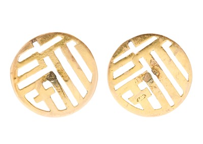 Lot 44 - A pair of 14ct Chinese earring heads with pierced character decoration.