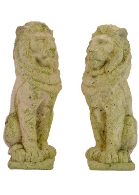 Lot 536 - Two reconstituted stone figures of seated lions.