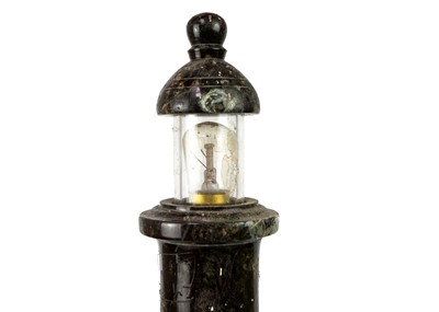 Lot 70 - A Cornish turned serpentine lighthouse table lamp.