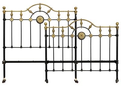 Lot 594 - A late Victorian brass and iron double bedstead.