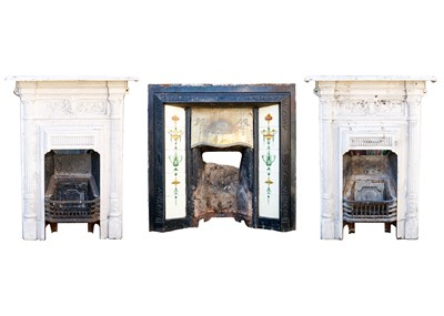 Lot 107 - A Victorian cast iron and brass fire insert, with tiled panels.