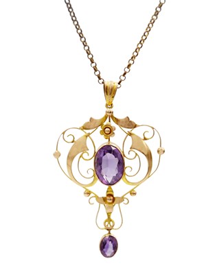 Lot 46 - A 9ct amethyst set Art Nouveau openwork pendant on 9ct necklace.