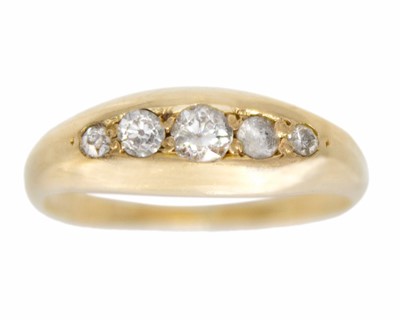 Lot 51 - An 18ct diamond set five stone child's ring.