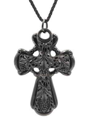 Lot 60 - A Victorian carved jet large cross pendant.