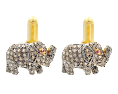 Lot 70 - A pair of silver gilt diamond and ruby set elephant cufflinks.