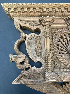 Lot 66 - An Indian hardwood panel.