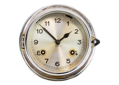 Lot 572 - A mid century German chrome ship's bulkhead clock.