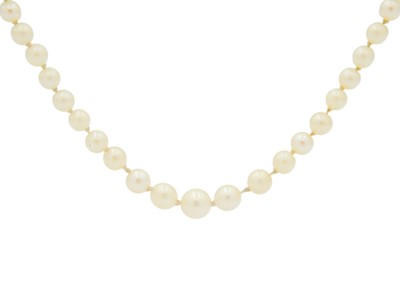 Lot 240 - A graduated cultured pearl necklace with 14ct (tested) citrine set clasp.