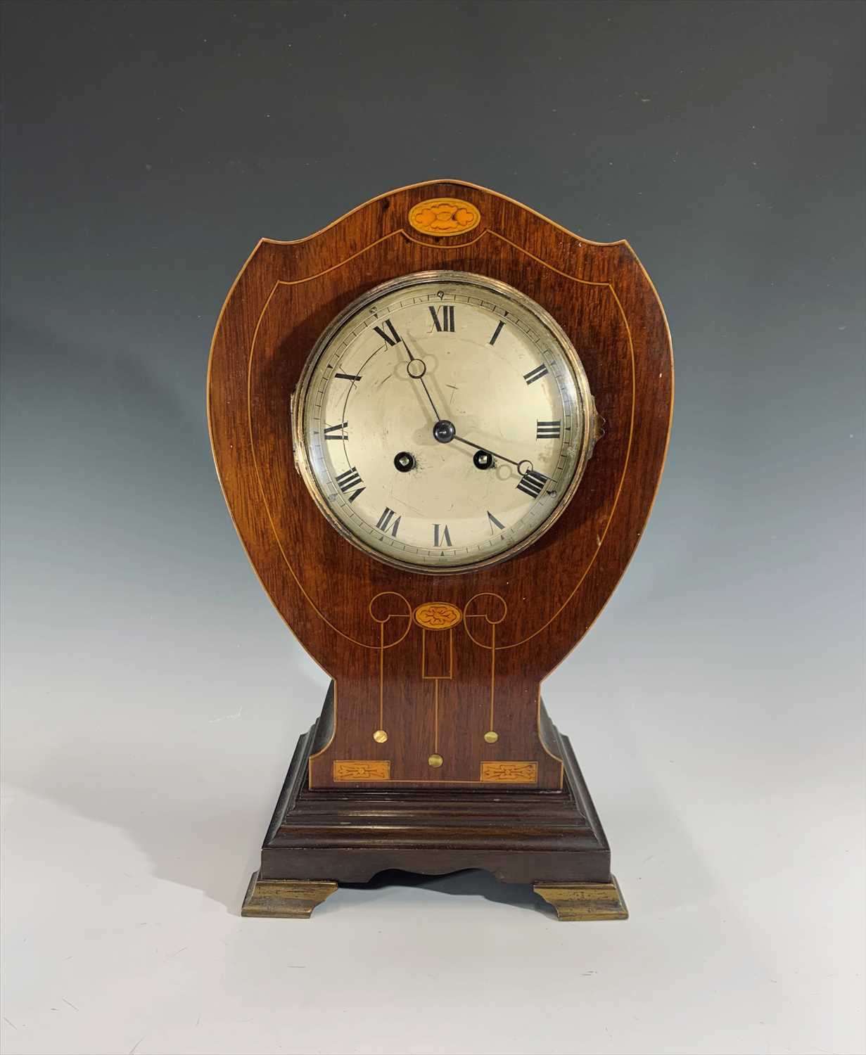 Lot 3305 - A mahogany Art Nouveau balloon clock, the