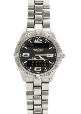 Lot 141 - BREITLING - An Aerospace titanium gentleman's quartz bracelet wristwatch.