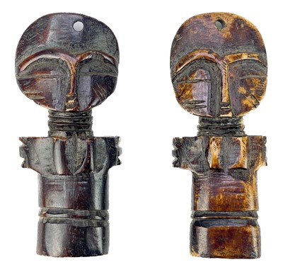 Lot 226 - A small bone Ashanti fertility doll.