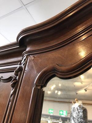 Lot 3520 - A French walnut armoire, 20th century, with a...